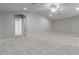 Large loft with carpet, ensuite bathroom and ceiling fan at 4287 E Clifton Ave, Gilbert, AZ 85295