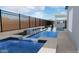 Modern pool with built-in seating and waterfall at 3473 W Mountain Vista Dr, Phoenix, AZ 85045