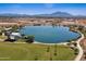 Community lake with walking paths and a gazebo at 2086 E Mead Dr, Gilbert, AZ 85298