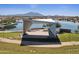 Modern gazebo near a lake in a community park at 2086 E Mead Dr, Gilbert, AZ 85298