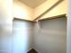 Spacious closet with double rods and shelving at 17323 W Woodlands Ave, Goodyear, AZ 85338