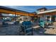 Inviting outdoor patio with comfortable seating, perfect for relaxation and social gatherings at 9746 E Thornbush Ave, Mesa, AZ 85212