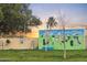 Pet-friendly dog park with playful mural and convenient washing station for furry friends at 17200 W Bell Rd # 667, Surprise, AZ 85374