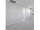 This bedroom features gray carpet, neutral walls, and a window with blinds at 4107 E Ghost Flower Ln, San Tan Valley, AZ 85140
