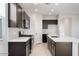Modern kitchen with stainless steel appliances, stylish countertops, and recessed lighting at 4107 E Ghost Flower Ln, San Tan Valley, AZ 85140