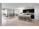 Open-concept living space features lots of natural light, a dining area, and a view of the modern kitchen at 4107 E Ghost Flower Ln, San Tan Valley, AZ 85140