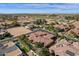 Drone shot shows a property in the desert near a field and a horse stable at 4301 E Taurus Pl, Chandler, AZ 85249