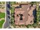 Overhead photo of the home shows a unique design with tile roof and desert plants at 4301 E Taurus Pl, Chandler, AZ 85249