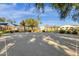 Vasaro community basketball court with mature shade trees, landscaping, and a shade structure nearby at 4301 E Taurus Pl, Chandler, AZ 85249