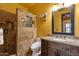 Bathroom featuring a granite countertop vanity and a tile and glass shower at 4301 E Taurus Pl, Chandler, AZ 85249