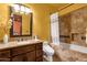 Bathroom with granite countertop vanity and shower over tub with tile surround at 4301 E Taurus Pl, Chandler, AZ 85249