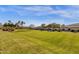 Expansive manicured green space and desert landscaping offer a beautiful view and natural light at 4301 E Taurus Pl, Chandler, AZ 85249