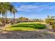 Expansive manicured green space and desert landscaping offer a beautiful view and natural light at 4301 E Taurus Pl, Chandler, AZ 85249