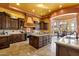 Spacious kitchen with custom cabinets and a large center island at 4301 E Taurus Pl, Chandler, AZ 85249