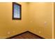 Empty room featuring a single window and wood floors at 4301 E Taurus Pl, Chandler, AZ 85249