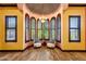 Sitting area featuring plantation shutters and matching chairs at 4301 E Taurus Pl, Chandler, AZ 85249