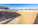 Empty lot backyard with block wall and mountain view at 17738 W Coolidge St, Goodyear, AZ 85395