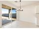 Bright dining area with sliding door access to backyard at 17738 W Coolidge St, Goodyear, AZ 85395