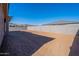 Large backyard with block wall and mountain view at 19026 W Ocotillo Rd, Waddell, AZ 85355