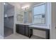 Bathroom with vanity and walk-in closet at 19026 W Ocotillo Rd, Waddell, AZ 85355