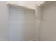 Small closet with hanging rod and shelving at 19026 W Ocotillo Rd, Waddell, AZ 85355