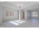 Elegant dining room with natural light and chandelier at 19026 W Ocotillo Rd, Waddell, AZ 85355