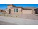 New construction home with a neutral color scheme and landscaping at 19026 W Ocotillo Rd, Waddell, AZ 85355