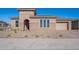 Single-story home with stone accents and a two-car garage at 19026 W Ocotillo Rd, Waddell, AZ 85355