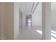 Bright hallway with views to the backyard at 19026 W Ocotillo Rd, Waddell, AZ 85355