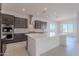 Bright kitchen with double ovens and ample counter space at 19026 W Ocotillo Rd, Waddell, AZ 85355