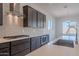 Modern kitchen with gas cooktop and stainless steel appliances at 19026 W Ocotillo Rd, Waddell, AZ 85355