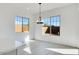 Bright breakfast nook with large windows and hardwood floors at 5923 N 83Rd Ln, Glendale, AZ 85305