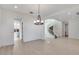 Spacious dining room with hardwood floors and a view of the staircase at 5923 N 83Rd Ln, Glendale, AZ 85305