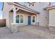 House entrance with stone columns and covered porch at 5923 N 83Rd Ln, Glendale, AZ 85305