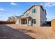 Two-story house with backyard and neutral color scheme at 5923 N 83Rd Ln, Glendale, AZ 85305