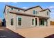 Two-story house with backyard and neutral color scheme at 5923 N 83Rd Ln, Glendale, AZ 85305