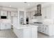 Modern kitchen with white cabinets and stainless steel appliances at 5923 N 83Rd Ln, Glendale, AZ 85305