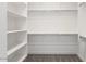 Large walk-in closet, offering plenty of storage with shelves and hanging space at 5923 N 83Rd Ln, Glendale, AZ 85305