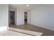 Minimalist bedroom with hardwood flooring, ample natural light, and neutral color palette at 2130 E Turney Ave # 4, Phoenix, AZ 85016