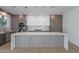 Well-appointed kitchen showcasing sleek cabinetry, stainless steel appliances, and a large island at 2130 E Turney Ave # 4, Phoenix, AZ 85016
