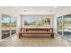 Bright dining room with farmhouse table and access to backyard at 30120 N 70Th St, Scottsdale, AZ 85266