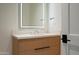 Bathroom with modern vanity, sleek countertop, designer mirror and hardware, and contemporary lighting at 5000 N Camelback Ridge Rd # 201, Scottsdale, AZ 85251