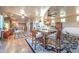 Spacious common area with hardwood floors, featuring a sitting area and dining space at 15339 E Red Bird Rd, Scottsdale, AZ 85262