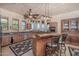 Spacious kitchen with island, stainless steel appliances, and wooden cabinets at 15339 E Red Bird Rd, Scottsdale, AZ 85262