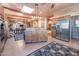 Spacious kitchen boasts a large island, stainless steel appliances, and rustic wooden cabinetry at 15339 E Red Bird Rd, Scottsdale, AZ 85262