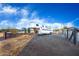 White horse trailer parked at gated entrance to property at 15339 E Red Bird Rd, Scottsdale, AZ 85262