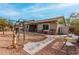 This spacious backyard features a playset and plenty of room for outdoor activities at 22004 W Moonlight Path, Buckeye, AZ 85326