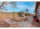 This property boasts a spacious backyard with playset and space for relaxing at 22004 W Moonlight Path, Buckeye, AZ 85326