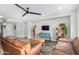 Spacious living room with modern decor, an area rug, and comfortable seating at 22004 W Moonlight Path, Buckeye, AZ 85326