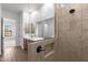 Modern bathroom showcases walk-in shower with glass, offering spa-like experience at 12308 W Parkway Ln, Avondale, AZ 85323